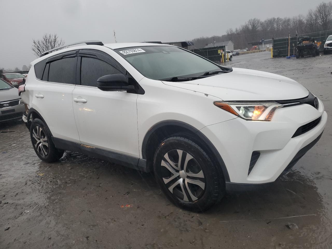 2017 Toyota RAV 4 VIN 2T3BFREV8HW593081 Copart auction photo, side / rear end damage thumbnail 4