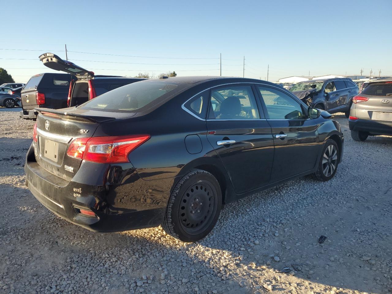 2019 Nissan Sentra VIN 3N1AB7AP0KY213593 Copart auction photo, front end / minor dent/scratches damage thumbnail 3