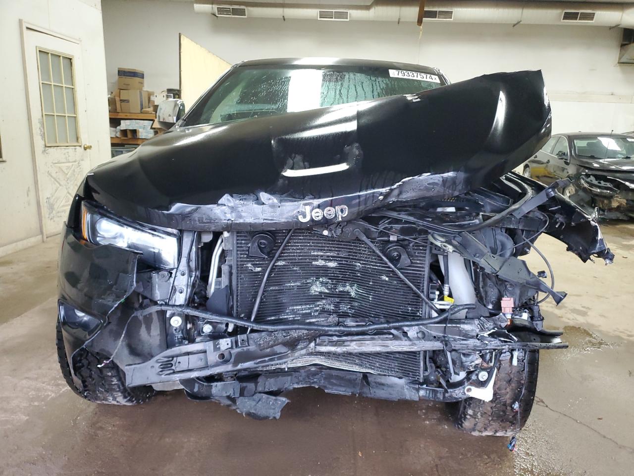 2017 Jeep Grand Cherokee VIN 1C4RJFAG0HC894983 Copart auction photo, front end / side damage thumbnail 5