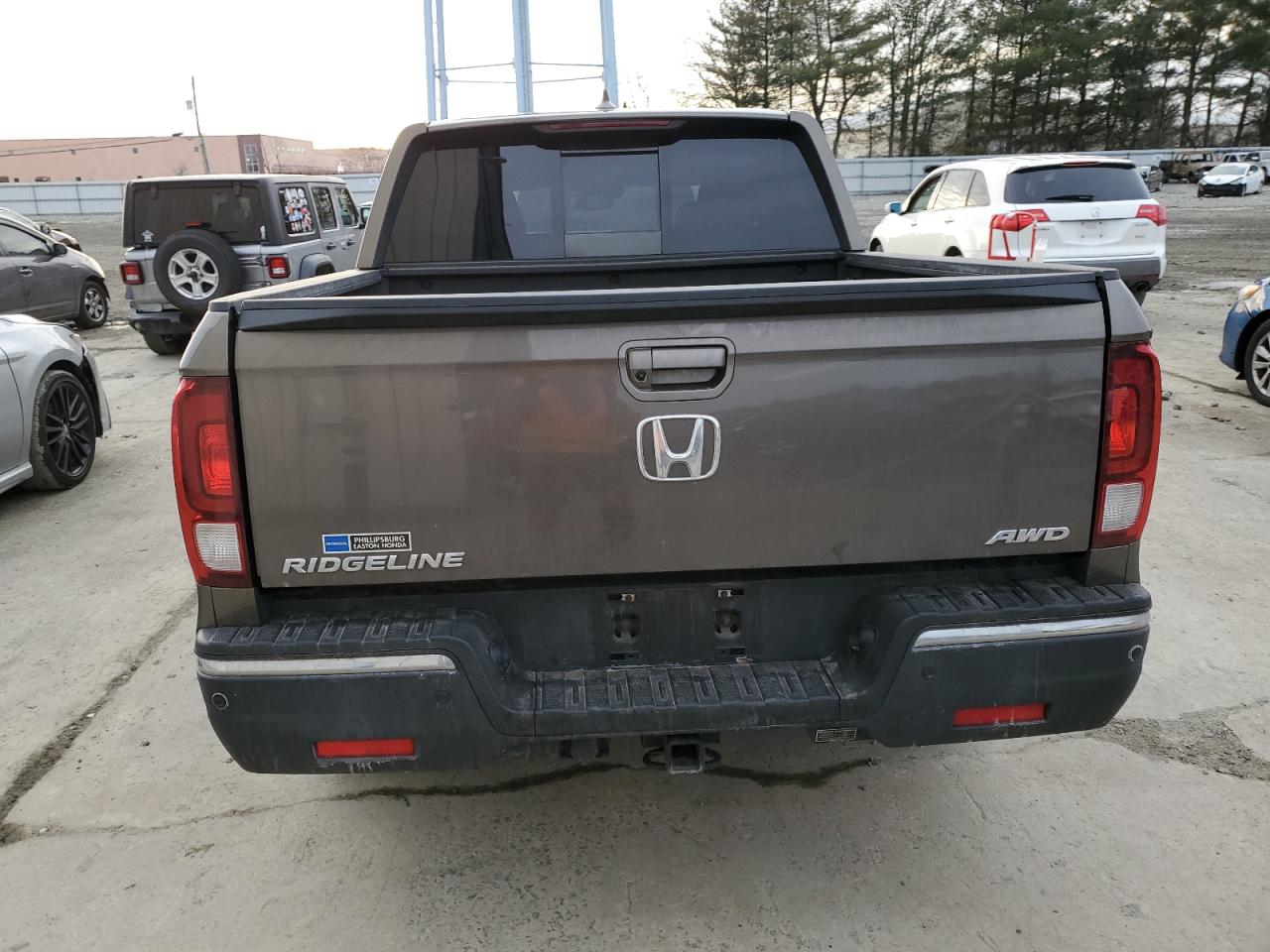 2020 Honda Ridgeline VIN 5FPYK3F73LB001479 Copart auction photo, minor dent/scratches damage thumbnail 6
