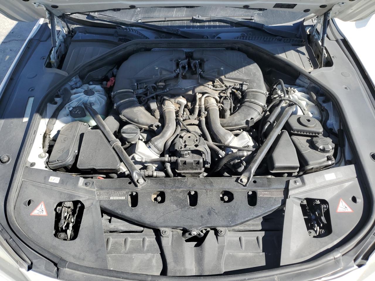 2012 BMW 7er VIN WBAKB8C51CC852429 Copart auction photo, mechanical / front end damage thumbnail 11