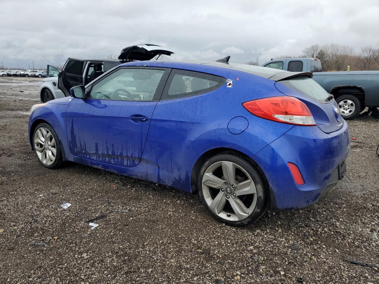 2012 Hyundai Veloster VIN KMHTC6AD7CU053098 Copart auction photo, vandalism / all over damage thumbnail 2