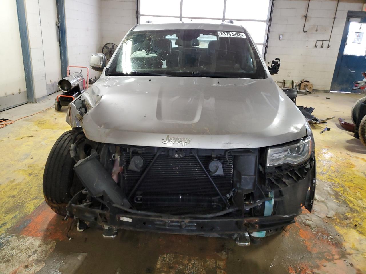 2014 Jeep Grand Cherokee VIN 1C4RJFCG4EC153213 Copart auction photo, front end / undercarriage damage thumbnail 5