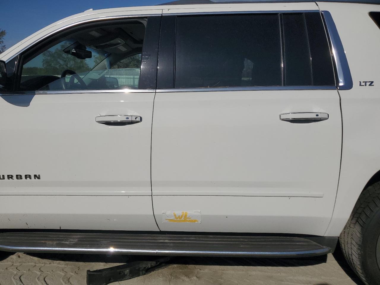 2015 Chevrolet Suburban VIN 1GNSKKKC0FR631381 Copart auction photo, water/flood damage thumbnail 13