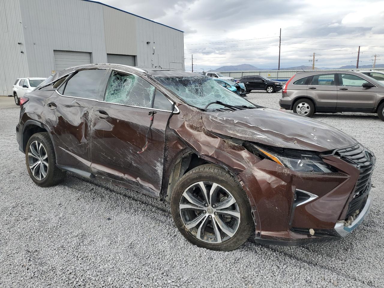 2016 Lexus RX VIN 2T2BZMCA2GC038965 Copart auction photo, rollover damage thumbnail 4