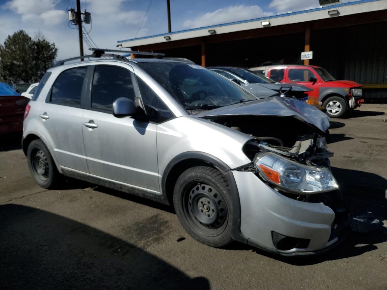 2012 Suzuki SX4 VIN JS2YB5A35C6302197 Copart auction photo, front end / hail damage thumbnail 4