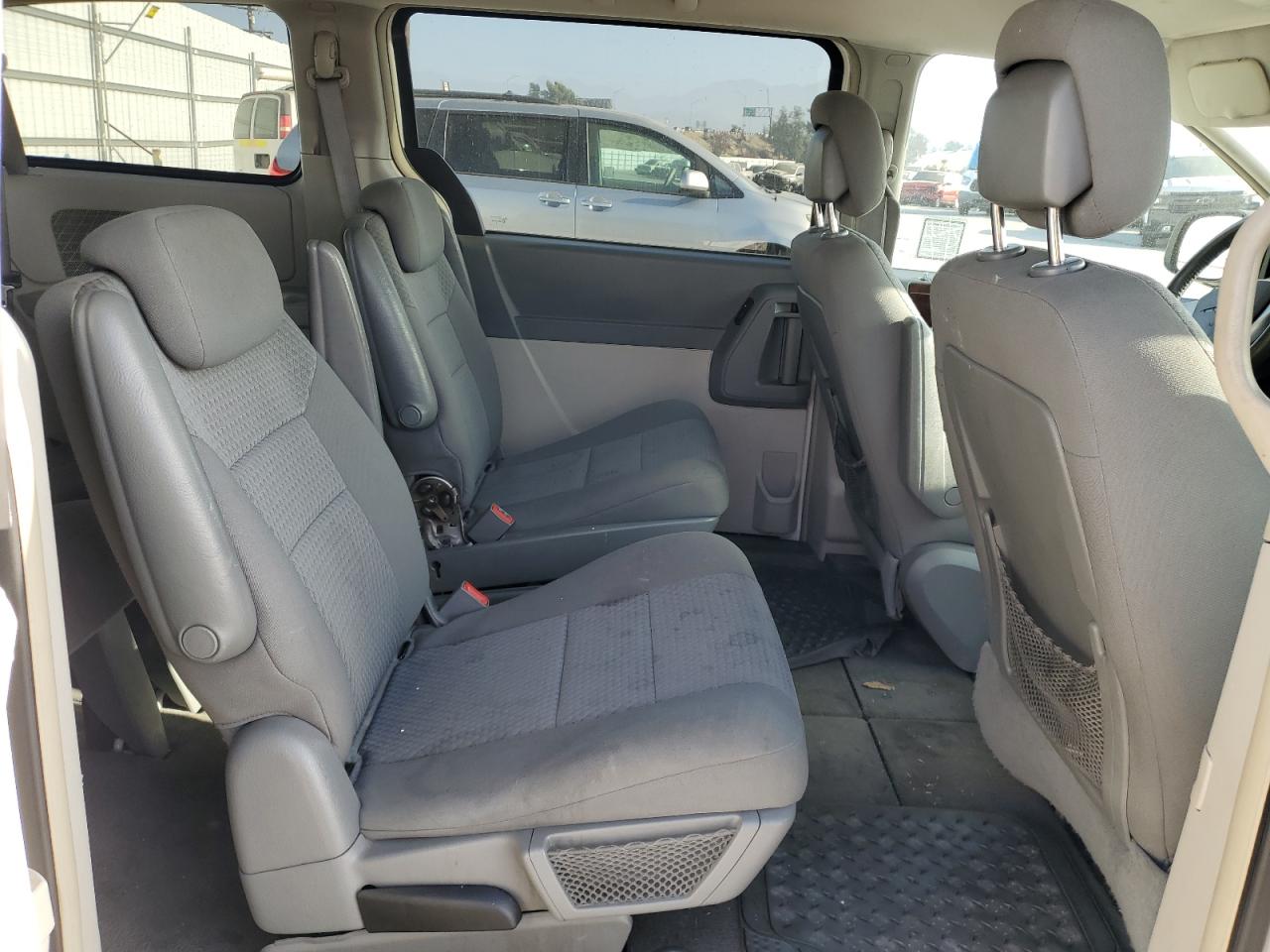 2010 Chrysler Town & Country VIN 2A4RR5D14AR479067 Copart auction photo, front end / side damage thumbnail 11