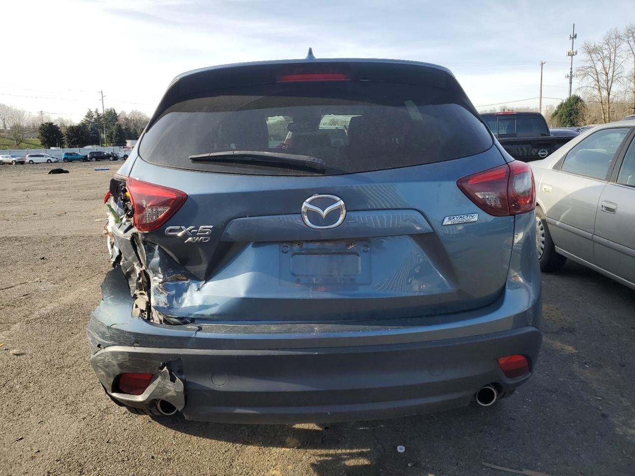 2016 Mazda CX-5 VIN JM3KE4DY4G0788915 Copart auction photo, rear end / side damage thumbnail 6