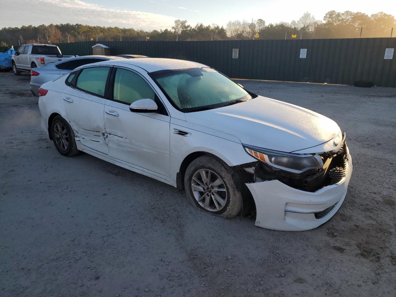 2017 KIA Optima VIN 5XXGT4L3XHG137525 Copart auction photo, side / front end damage thumbnail 4