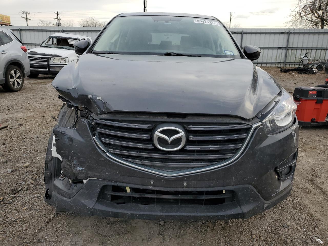 2016 Mazda CX-5 VIN JM3KE2DY6G0825855 Copart auction photo, front end / undercarriage damage thumbnail 5