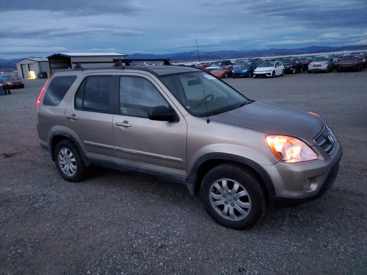 2006 Honda CR-V VIN JHLRD789X6C006034 Copart auction photo, minor dent/scratches damage thumbnail 4