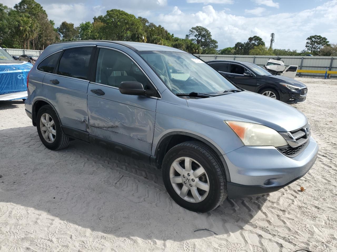 2011 Honda CR-V VIN 5J6RE4H49BL106708 Copart auction photo, side / minor dent/scratches damage thumbnail 4