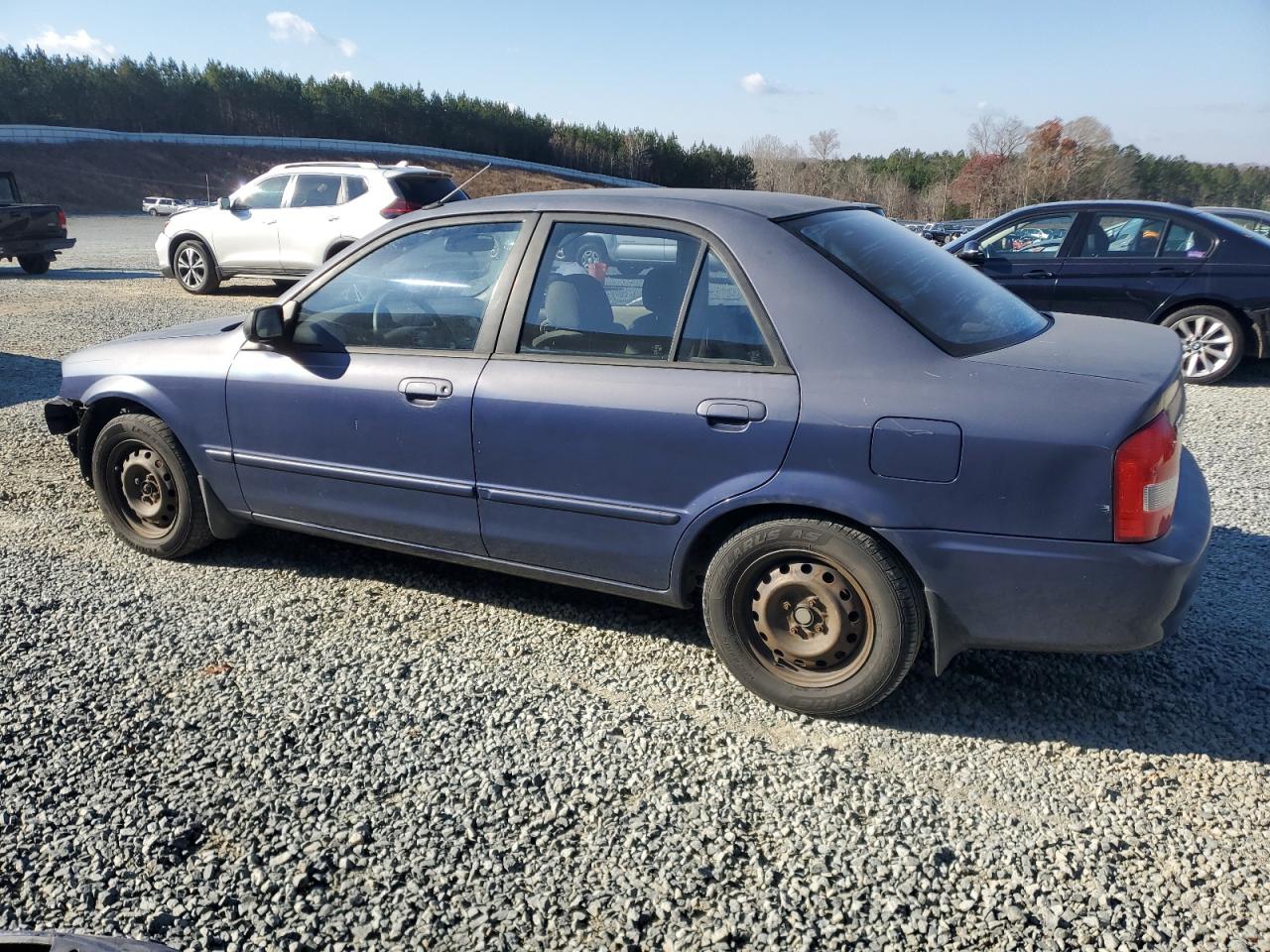 2000 Mazda Protege VIN JM1BJ2222Y0303549 Copart auction photo, front end / minor dent/scratches damage thumbnail 2