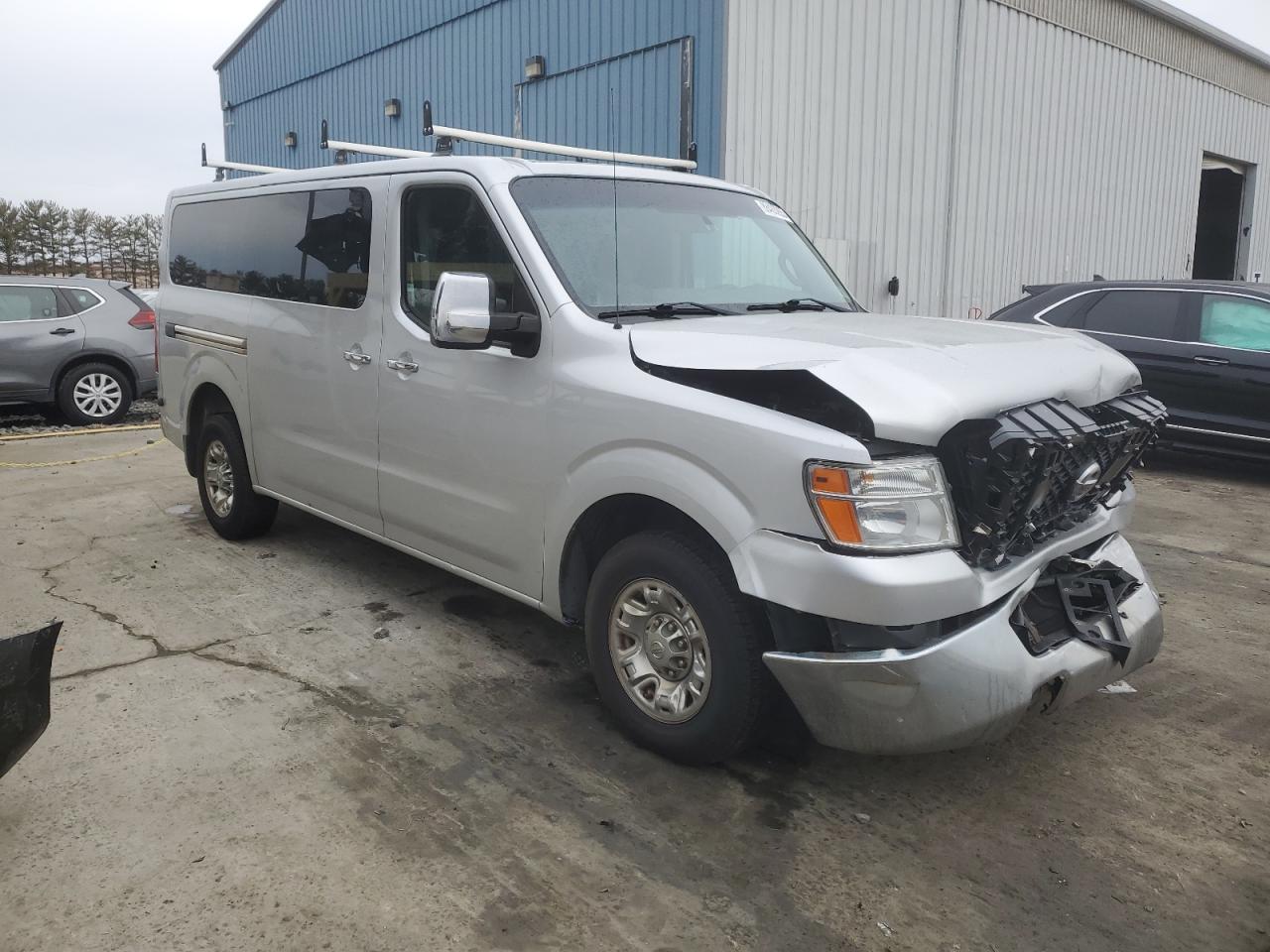2014 Nissan NV VIN 5BZBF0AA7EN160773 Copart auction photo, front end damage thumbnail 4