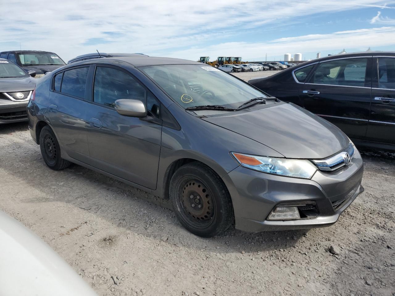 2012 Honda Insight VIN JHMZE2H53CS006533 Copart auction photo, side damage thumbnail 4