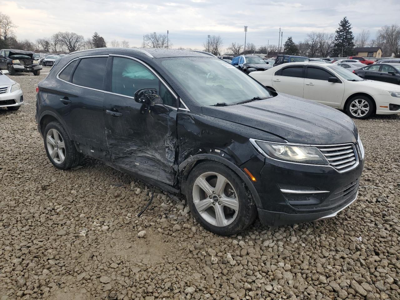 2016 Lincoln MKC VIN 5LMCJ1C96GUJ01047 Copart auction photo, side / front end damage thumbnail 4