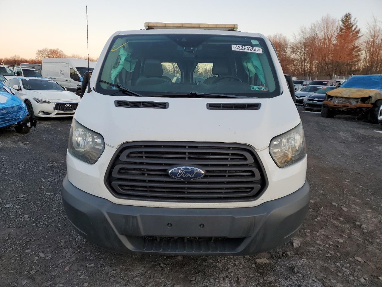 2016 Ford Transit VIN 1FTYE1ZM4GKA63584 Copart auction photo, side / front end damage thumbnail 5