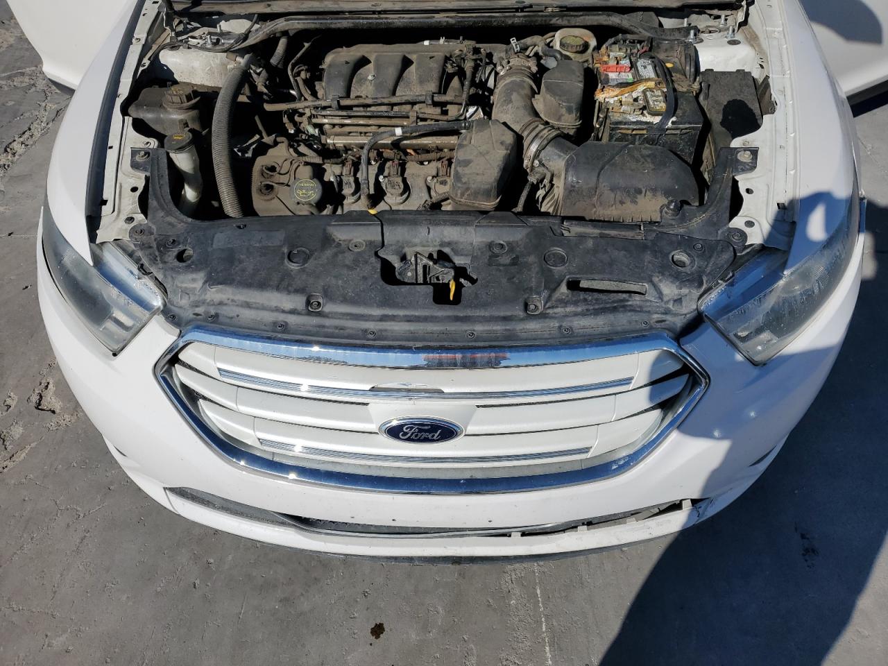 2015 Ford Taurus VIN 1FAHP2F80FG146606 Copart auction photo, side / front end damage thumbnail 11