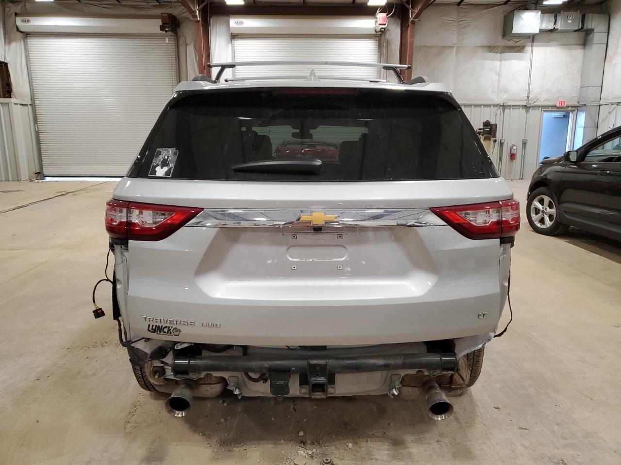 2021 Chevrolet Traverse VIN 1GNEVHKW7MJ265576 Copart auction photo, rear end damage thumbnail 6