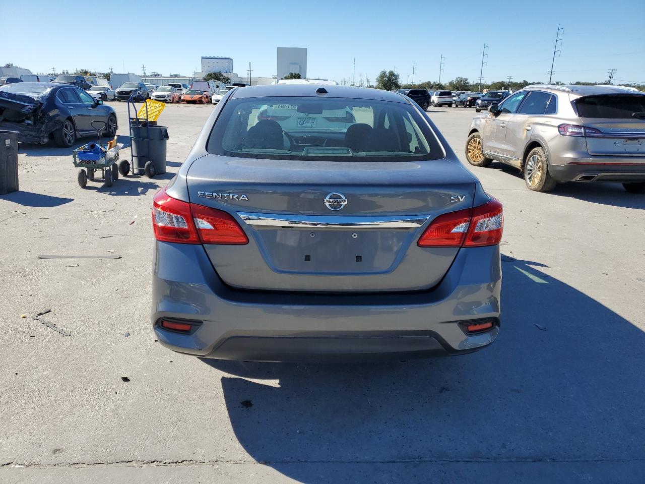 2019 Nissan Sentra VIN 3N1AB7AP1KY310110 Copart auction photo, front end / minor dent/scratches damage thumbnail 6