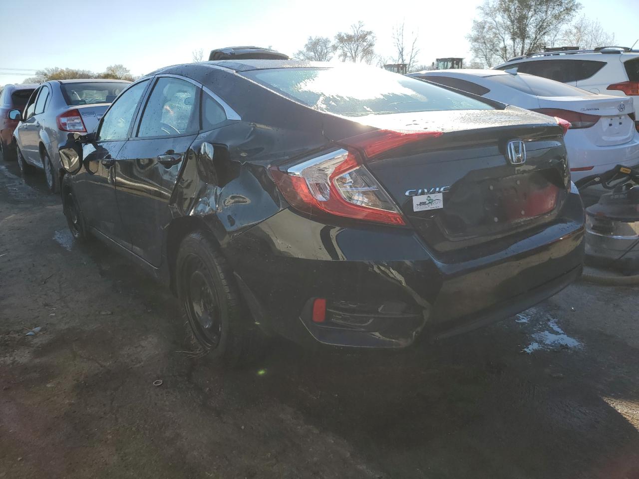 2018 Honda Civic VIN 2HGFC2F54JH599600 Copart auction photo, rollover damage thumbnail 2