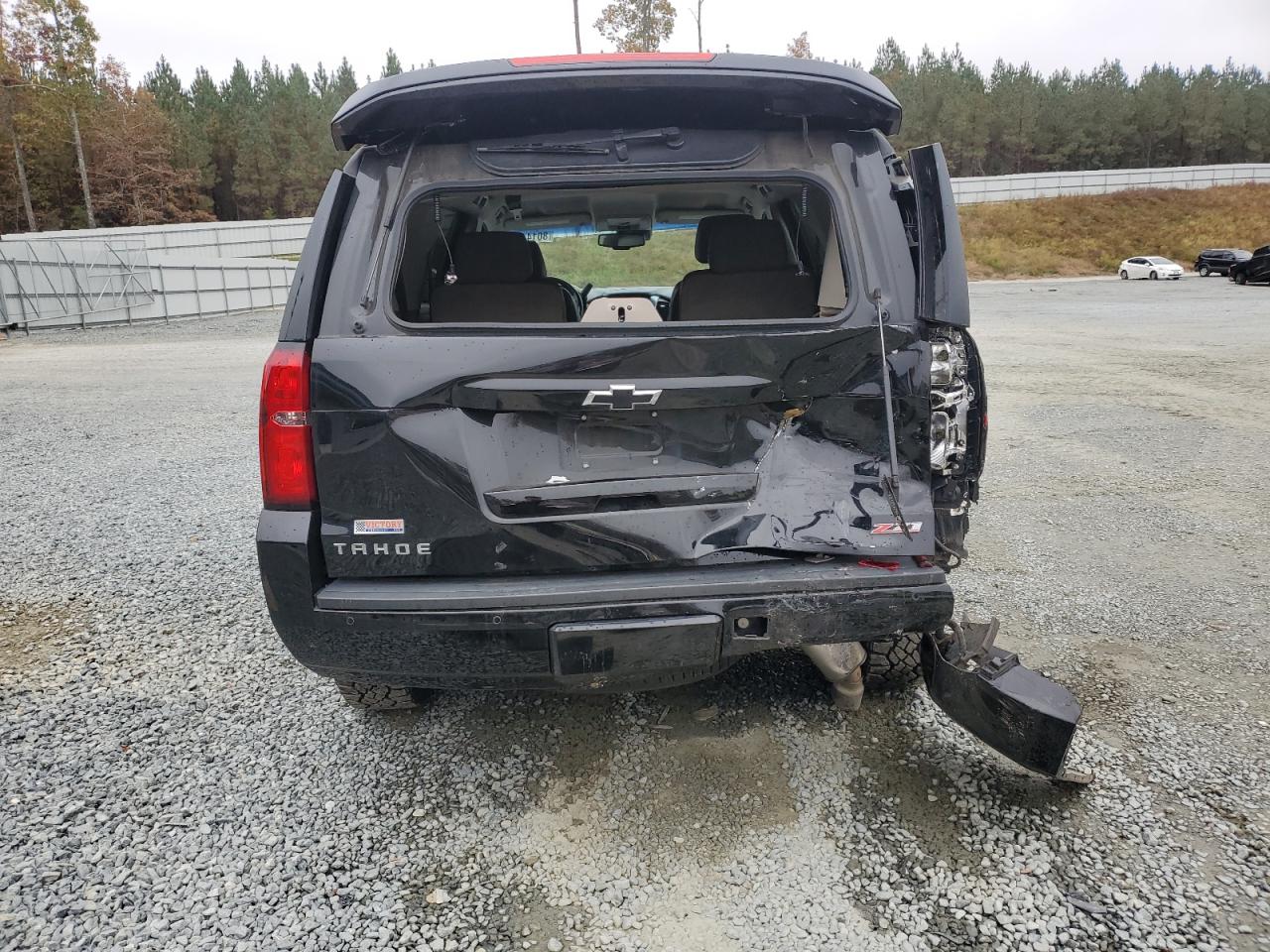 2019 Chevrolet Tahoe VIN 1GNSKBKC1KR211235 Copart auction photo, all over damage thumbnail 6