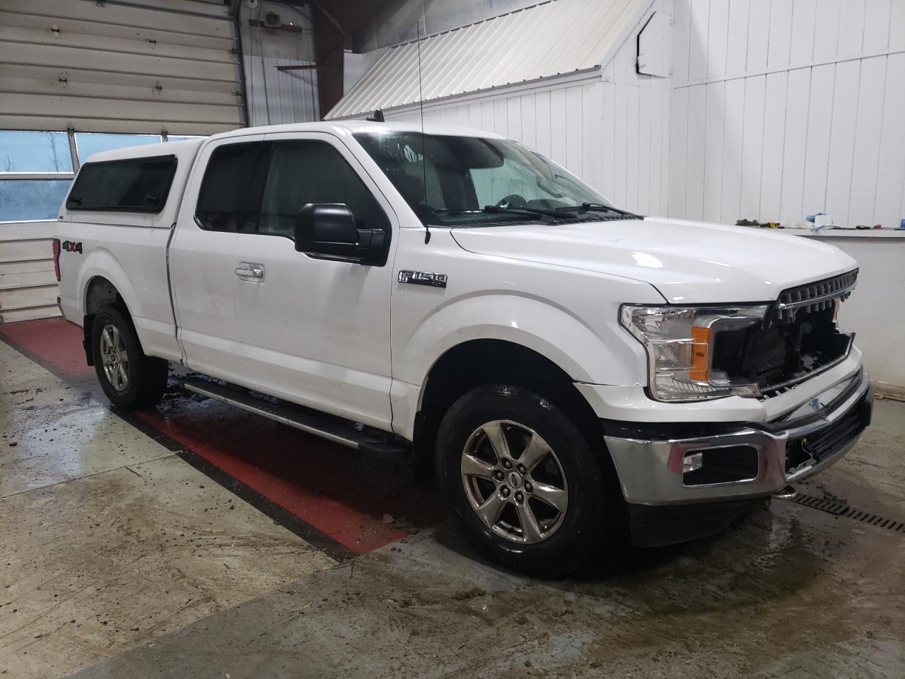 2020 Ford F-150 VIN 1FTFX1E52LKD42574 Copart auction photo, front end damage thumbnail 4