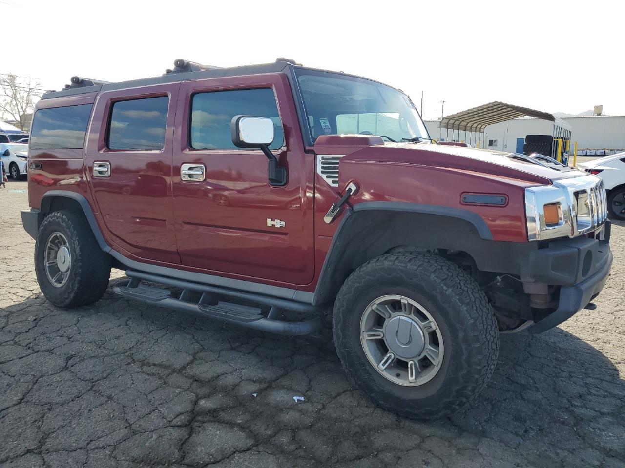 2003 Hummer H2 VIN 5GRGN23U73H128461 Copart auction photo, rear end damage thumbnail 4