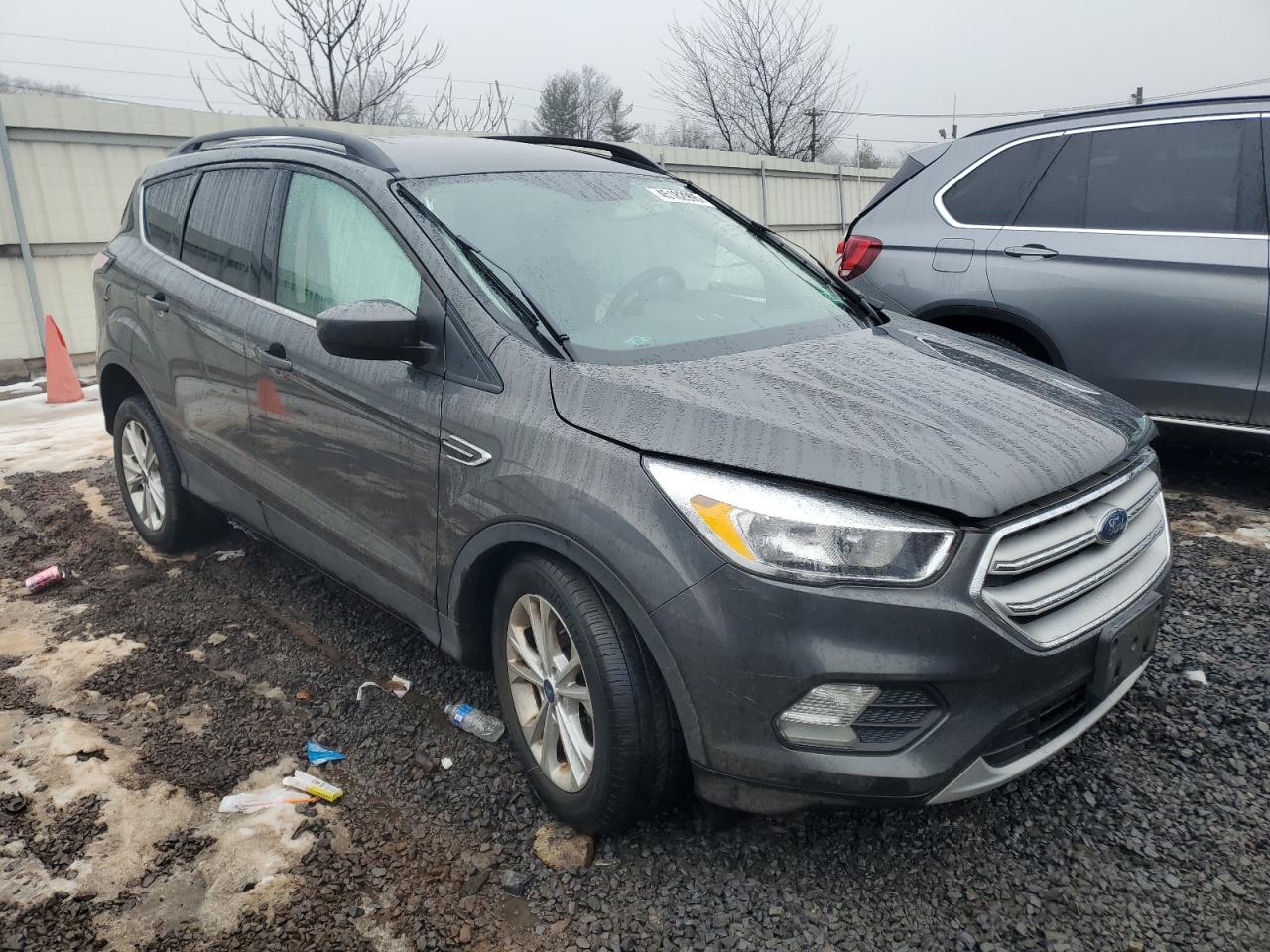 2018 Ford Escape VIN 1FMCU9GD3JUD12706 Copart auction photo, side damage thumbnail 4