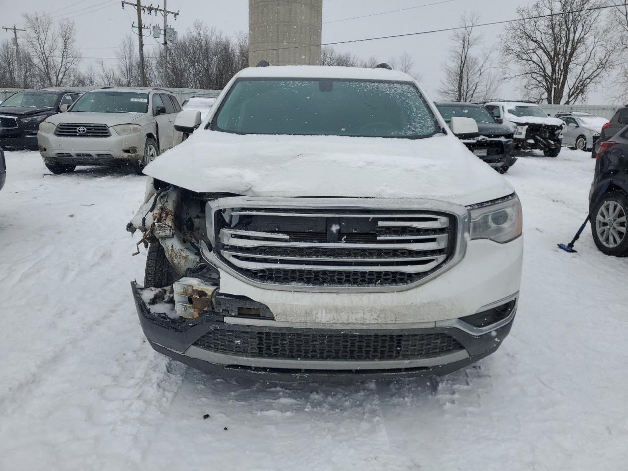 2017 GMC Acadia VIN 1GKKNULS9HZ284027 Copart auction photo, front end / side damage thumbnail 5