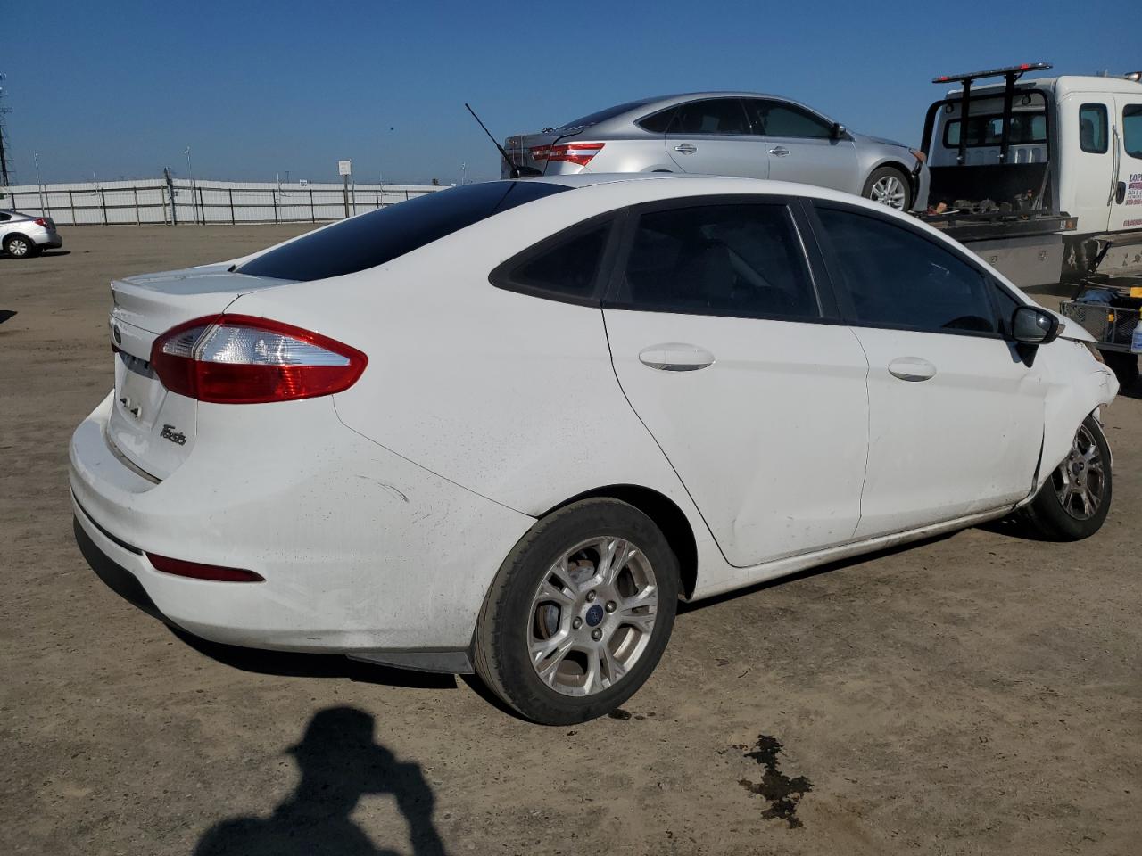 2016 Ford Fiesta VIN 3FADP4BJ3GM167640 Copart auction photo, front end / side damage thumbnail 3