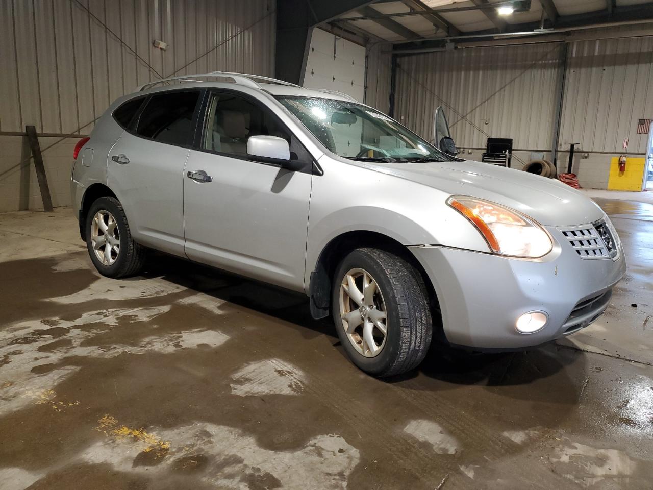 2010 Nissan Rogue VIN JN8AS5MT8AW500779 Copart auction photo, side / front end damage thumbnail 4