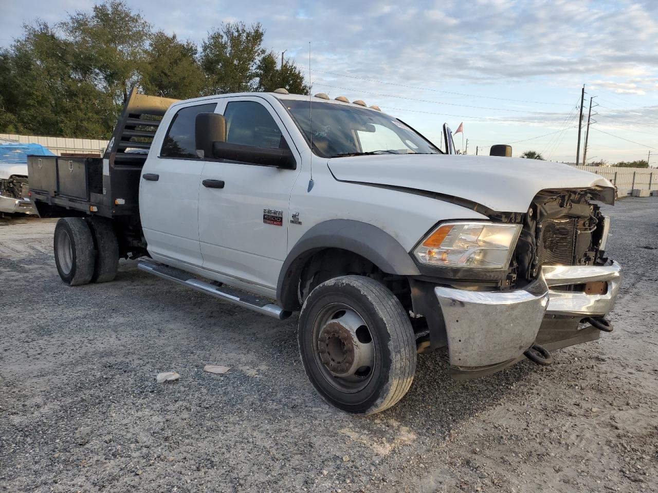 2012 Dodge RAM VIN 3C7WDMELXCG261177 Copart auction photo, front end / minor dent/scratches damage thumbnail 4
