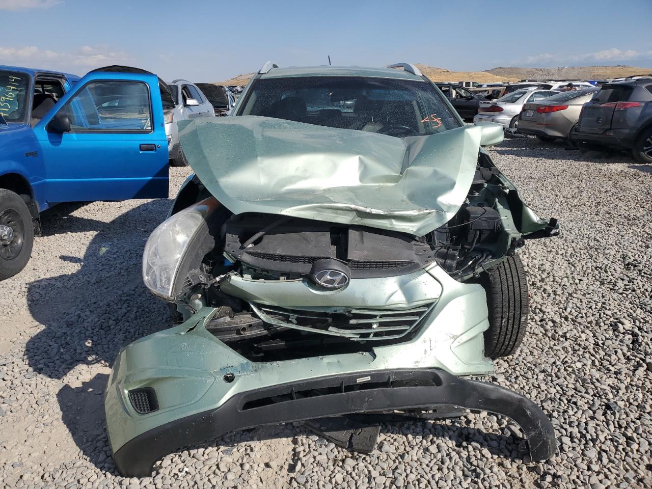 2011 Hyundai Tucson VIN KM8JUCAC5BU271274 Copart auction photo, front end damage thumbnail 5
