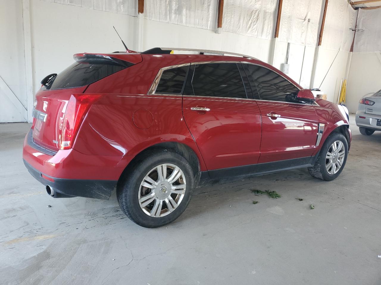 2012 Cadillac SRX VIN 3GYFNAE39CS645967 Copart auction photo, side / front end damage thumbnail 3