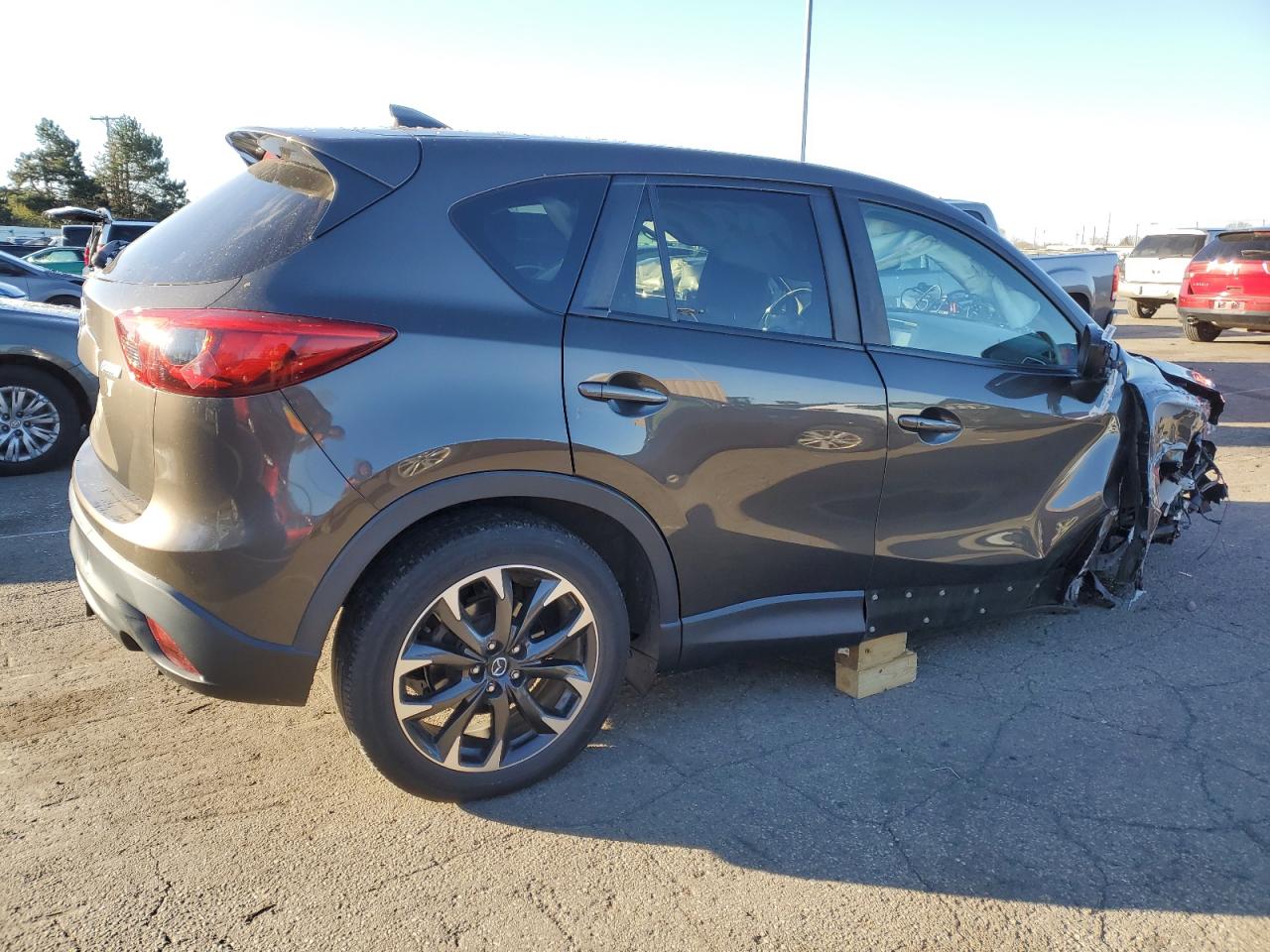2016 Mazda CX-5 VIN JM3KE4DY3G0722887 Copart auction photo, all over / undercarriage damage thumbnail 3