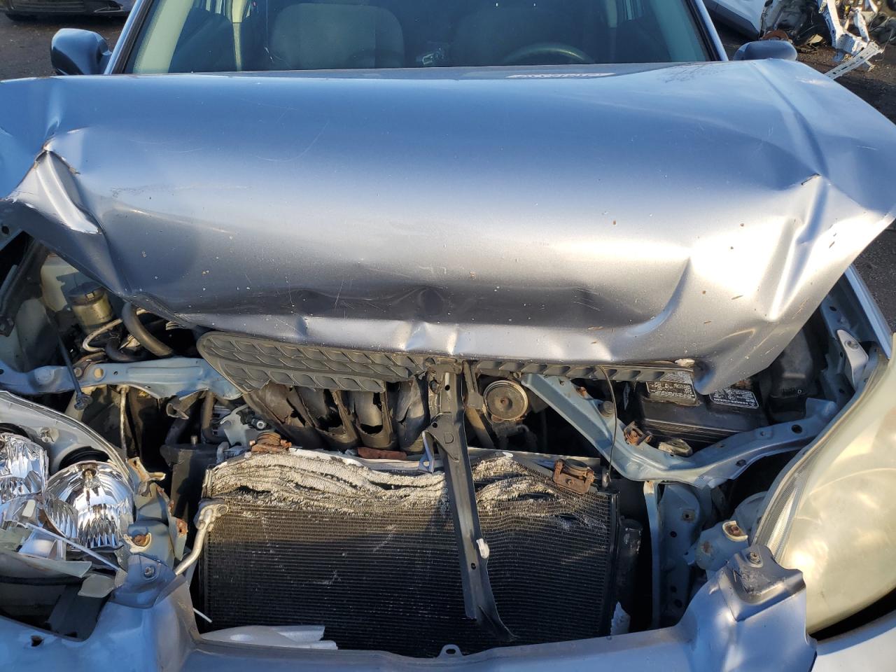 2005 Toyota Corolla VIN 2T1KR32E15C553228 Copart auction photo, front end / rear end damage thumbnail 11