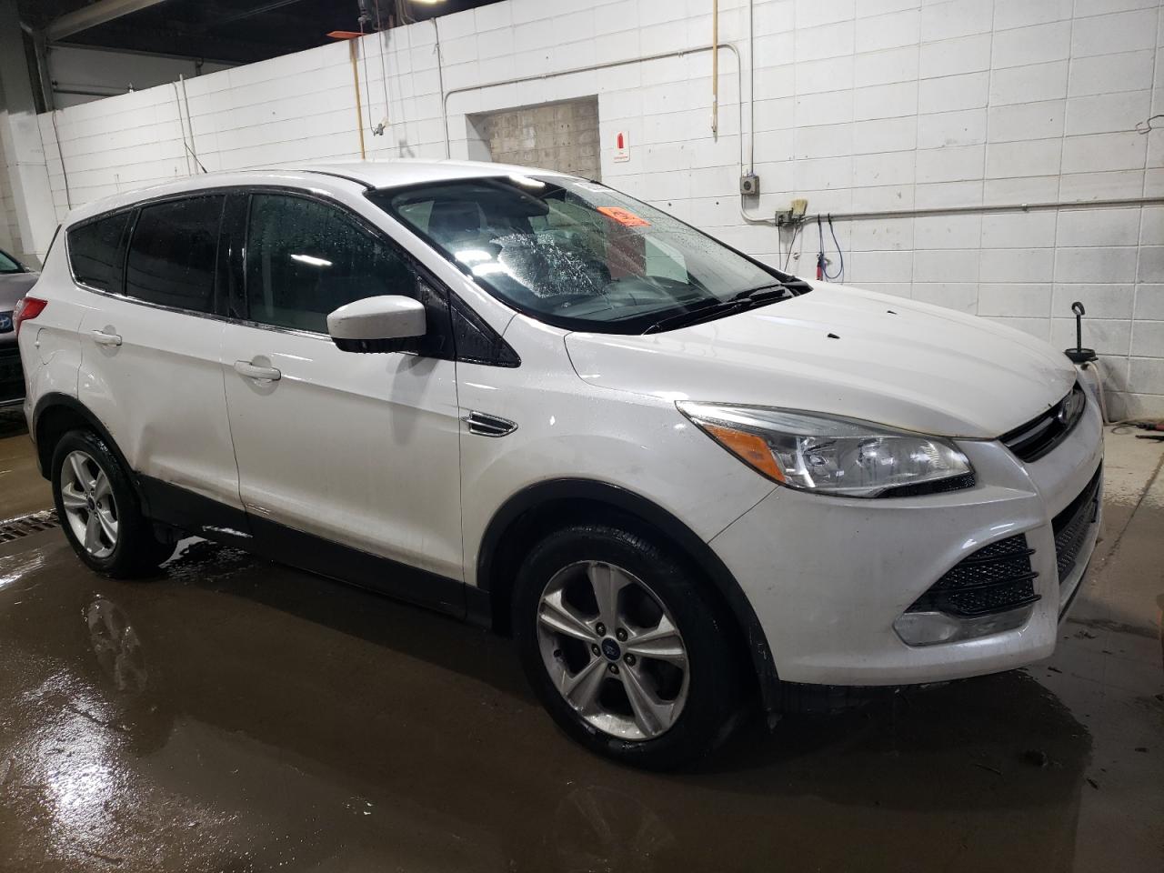 2015 Ford Escape VIN 1FMCU0GX0FUA78893 Copart auction photo, vandalism / side damage thumbnail 4