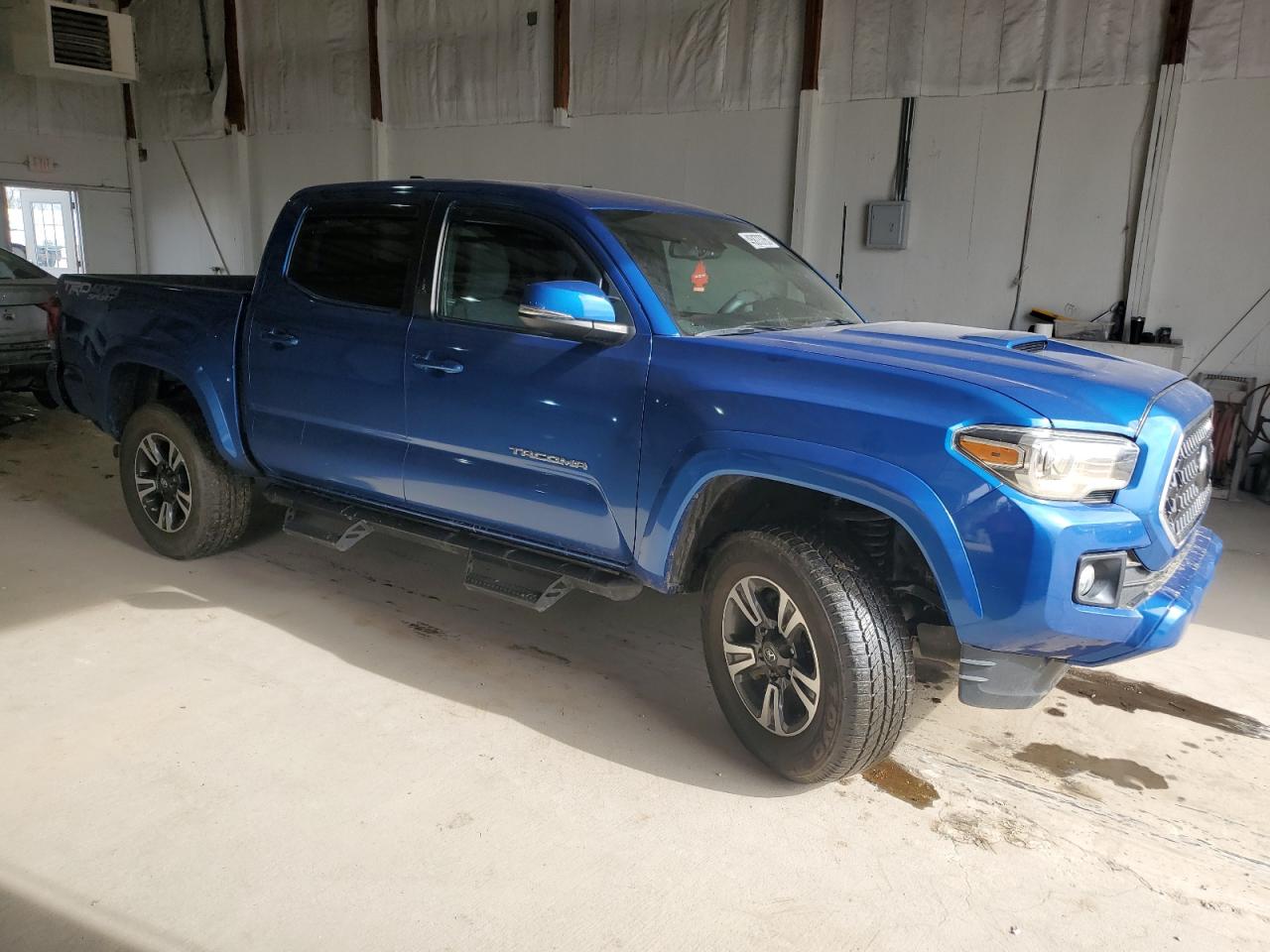 2018 Toyota Tacoma VIN 3TMCZ5AN4JM142554 Copart auction photo, water/flood damage thumbnail 4