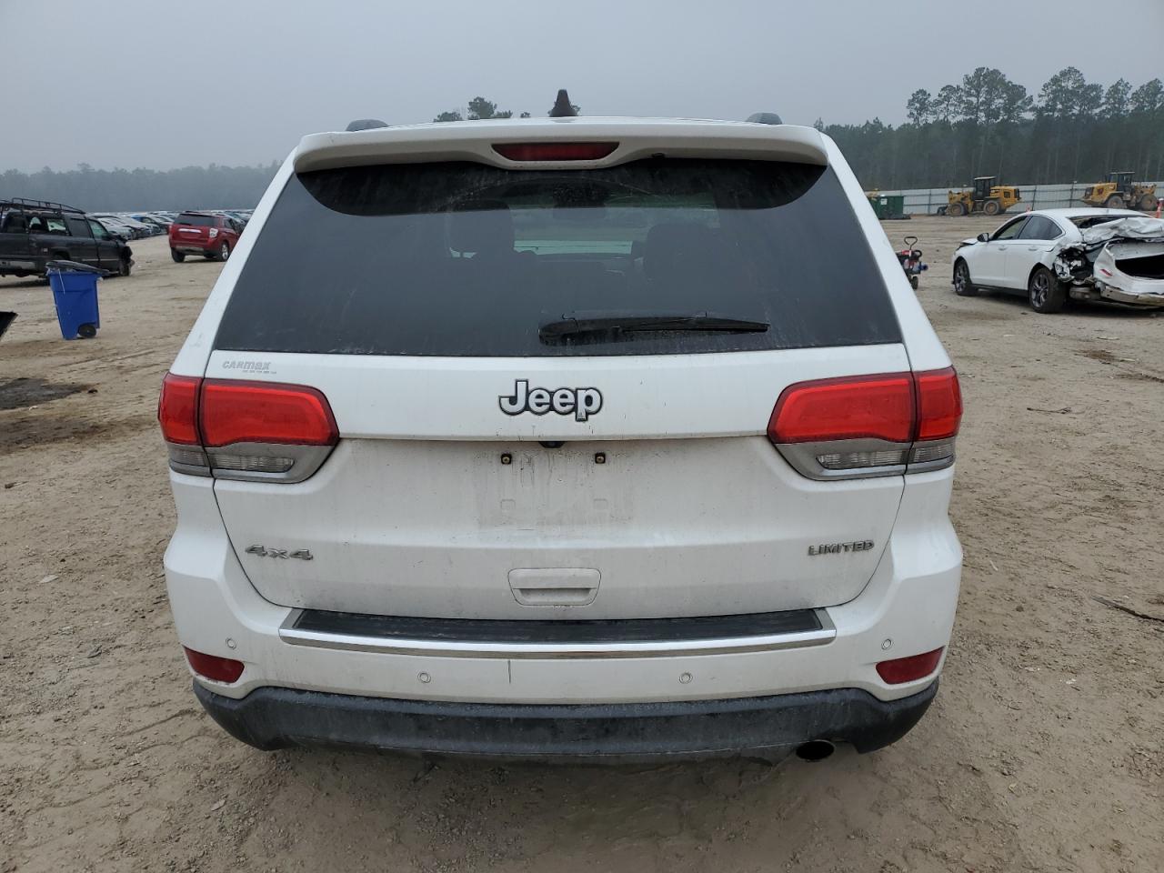 2015 Jeep Grand Cherokee VIN 1C4RJFBG4FC641824 Copart auction photo, front end / side damage thumbnail 6