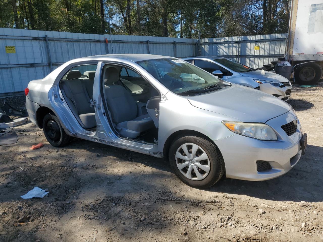 2009 Toyota Corolla VIN 1NXBU40EX9Z130000 Copart auction photo, side damage thumbnail 4