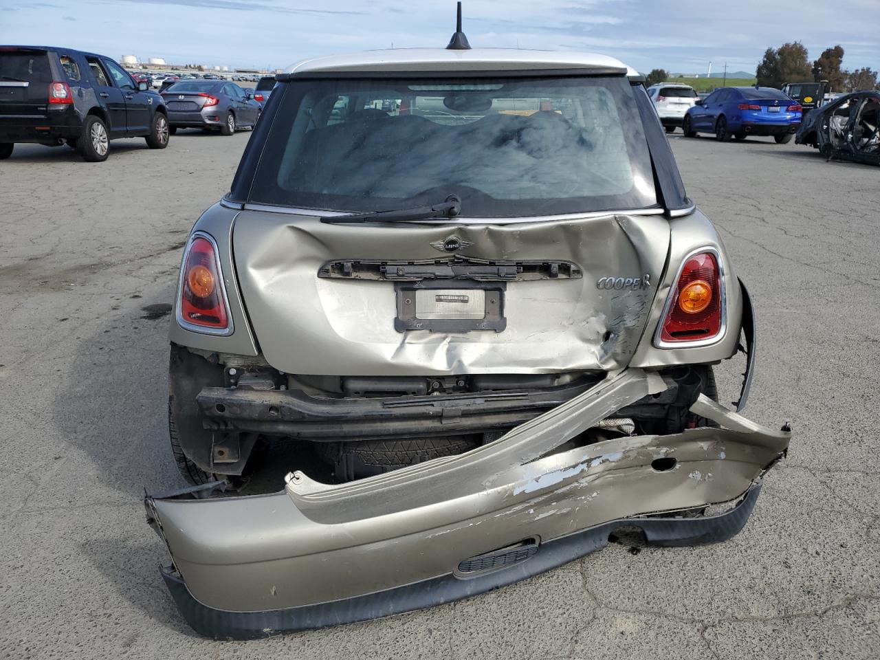 2009 MINI Cooper VIN WMWMF33569TT69401 Copart auction photo, rear end damage thumbnail 6