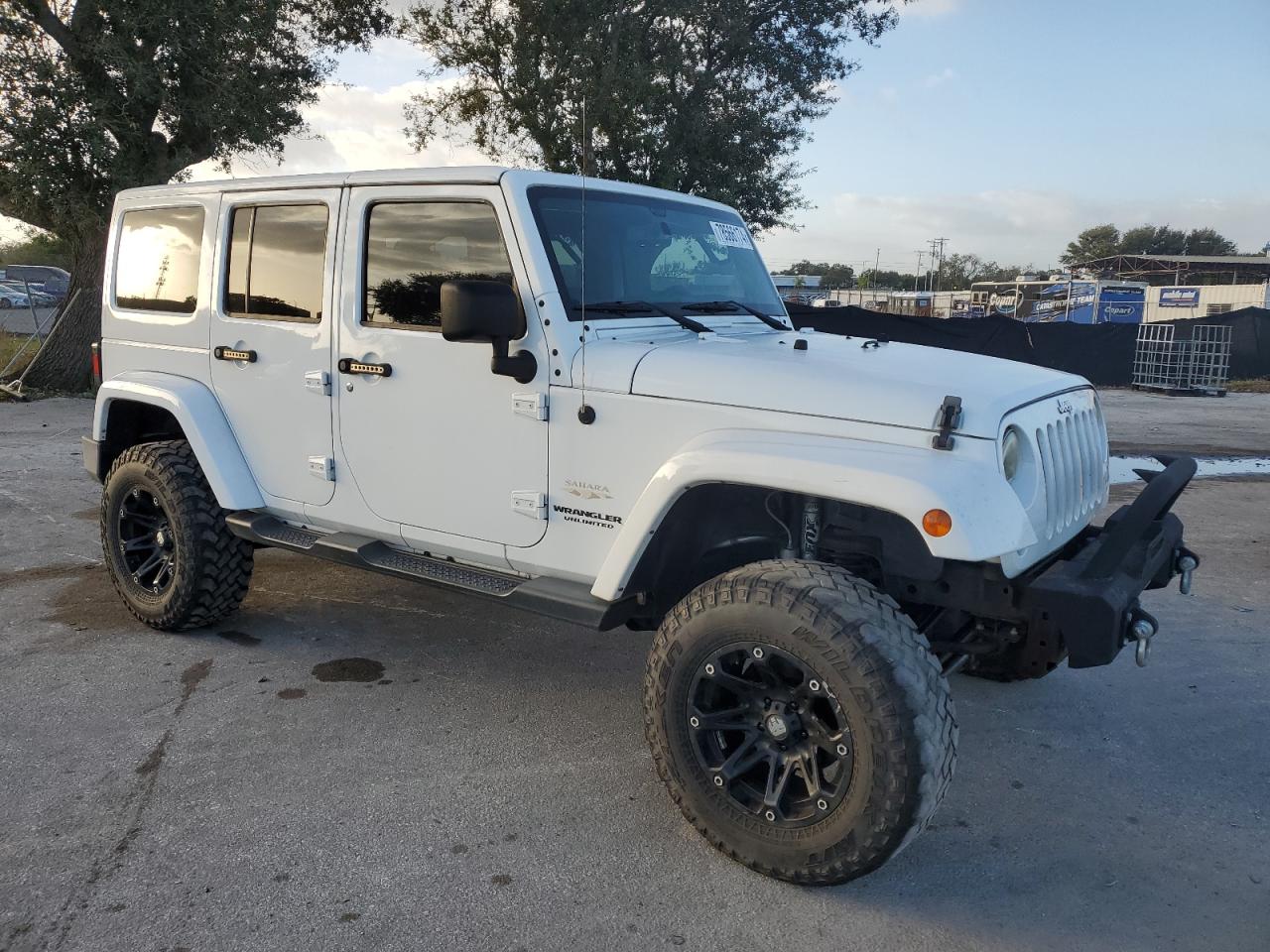 2015 Jeep Wrangler VIN 1C4BJWEGXFL614205 Copart auction photo, minor dent/scratches damage thumbnail 4