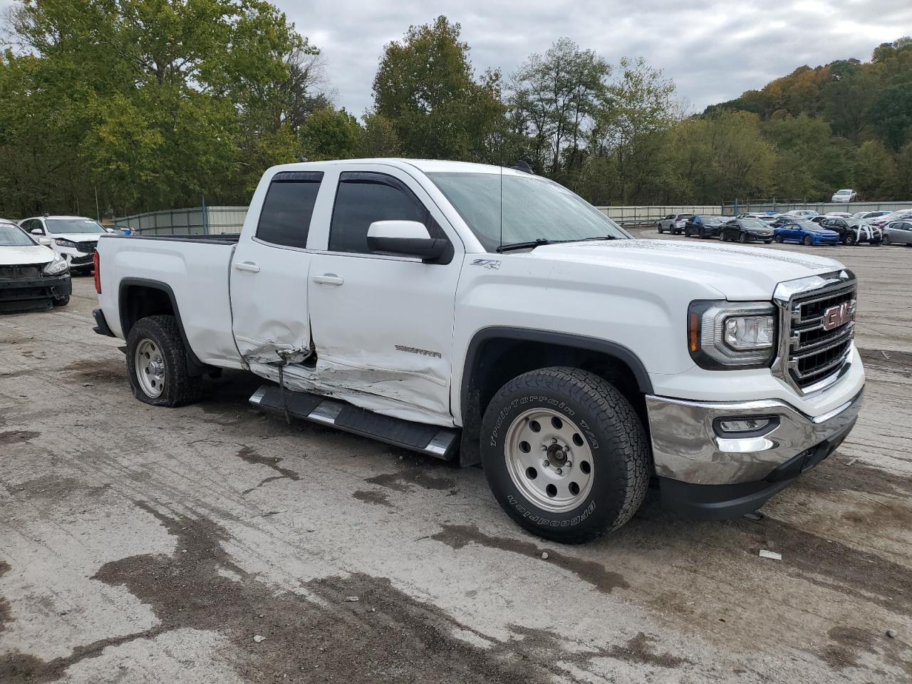 2017 GMC Sierra VIN 1GTV2MEC9HZ109767 Copart auction photo, side damage thumbnail 4