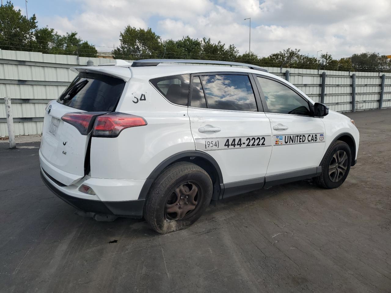 2018 Toyota RAV 4 VIN JTMZFREV4JJ165124 Copart auction photo, side / rear end damage thumbnail 3