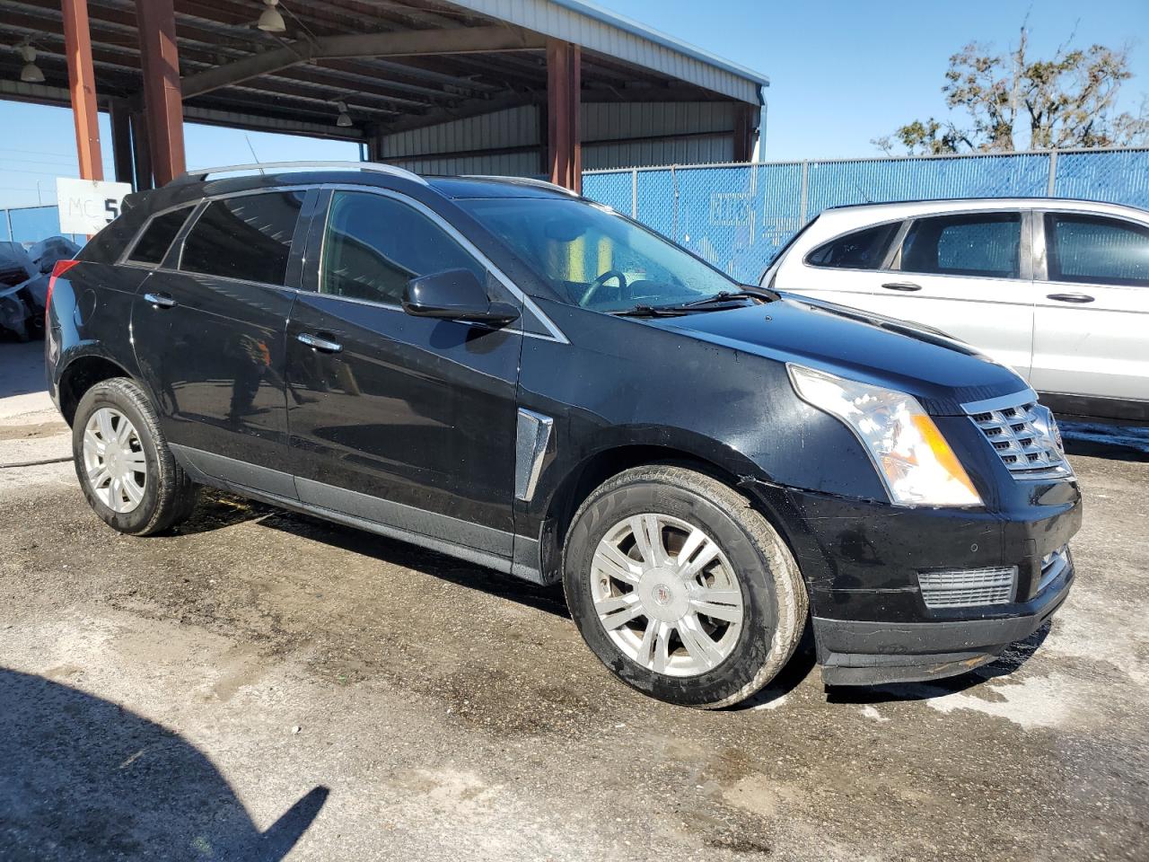 2014 Cadillac SRX VIN 3GYFNBE36ES677879 Copart auction photo, water/flood damage thumbnail 4