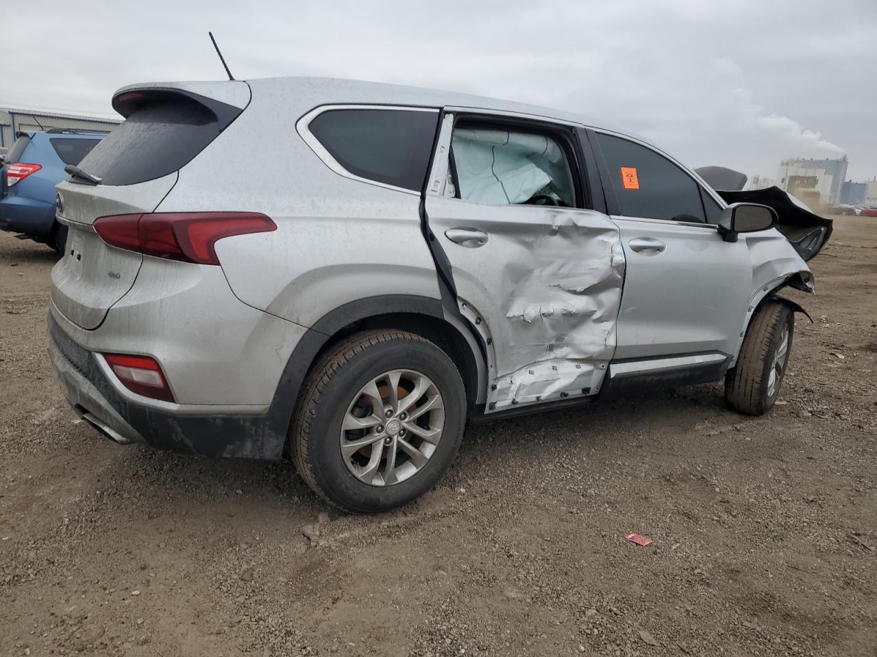 2019 Hyundai Santa Fe VIN 5NMS2CAD8KH117317 Copart auction photo, side / front end damage thumbnail 3