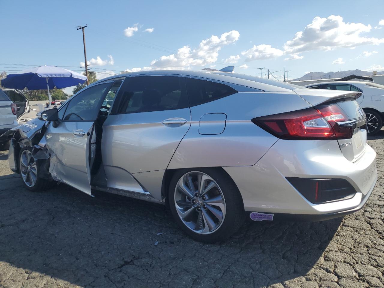 2018 Honda Clarity VIN JHMZC5F3XJC024303 Copart auction photo, side / front end damage thumbnail 2