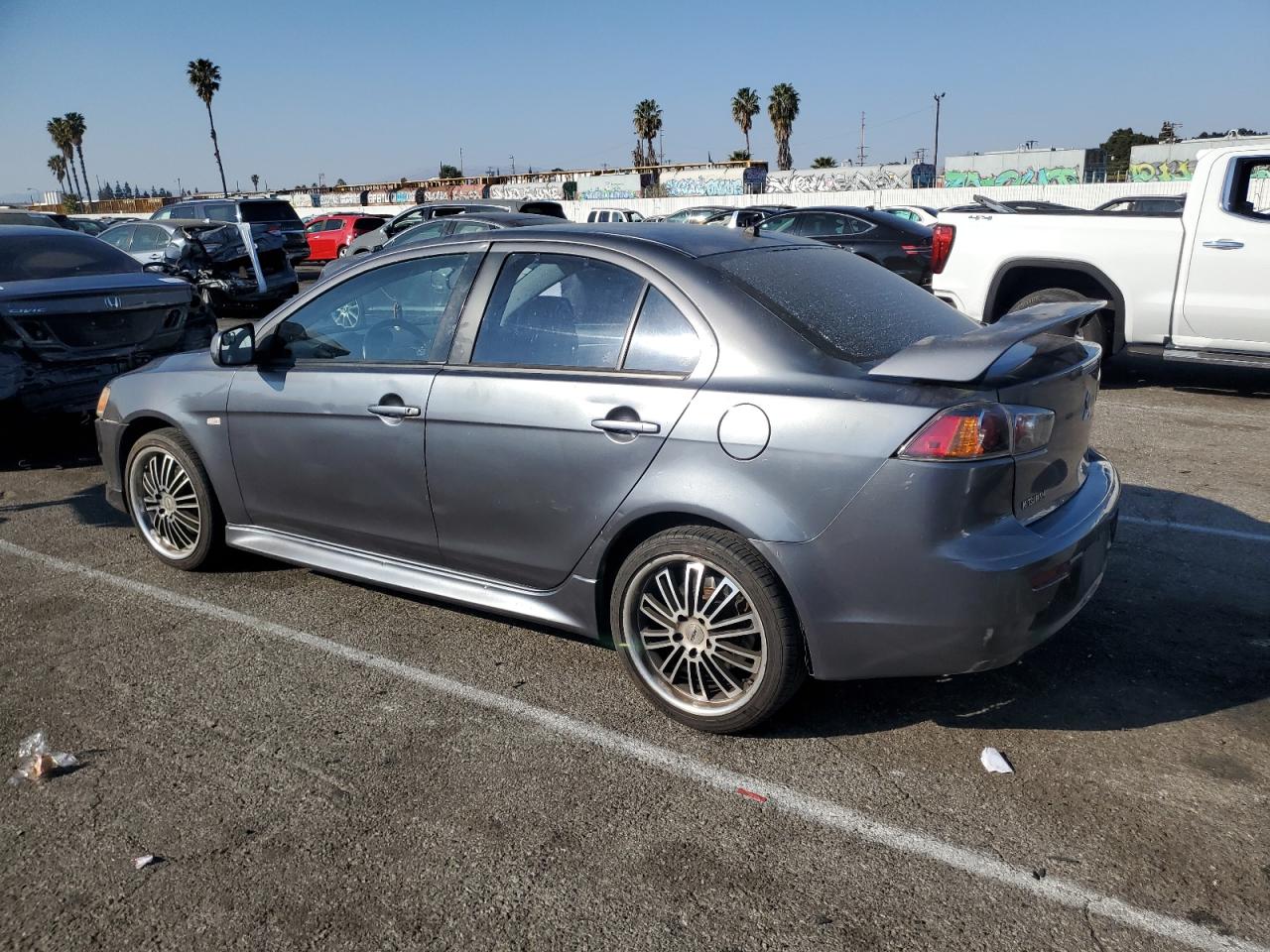 2010 Mitsubishi Lancer VIN JA32U8FW5AU011964 Copart auction photo, rear end / minor dent/scratches damage thumbnail 2