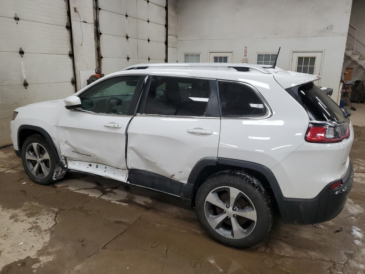2020 Jeep Grand Cherokee VIN 1C4PJMDX1LD506928 Copart auction photo, side / front end damage thumbnail 2